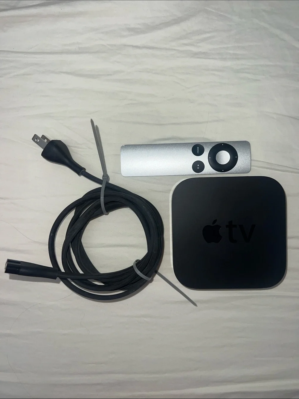 3rd Generation Apple TV factory reset with original silver remote and cable